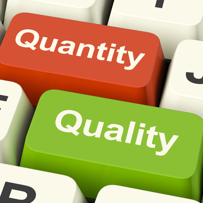 Quality And Quantity Computer Keys Showing Choice Between Excellence Or Amount
